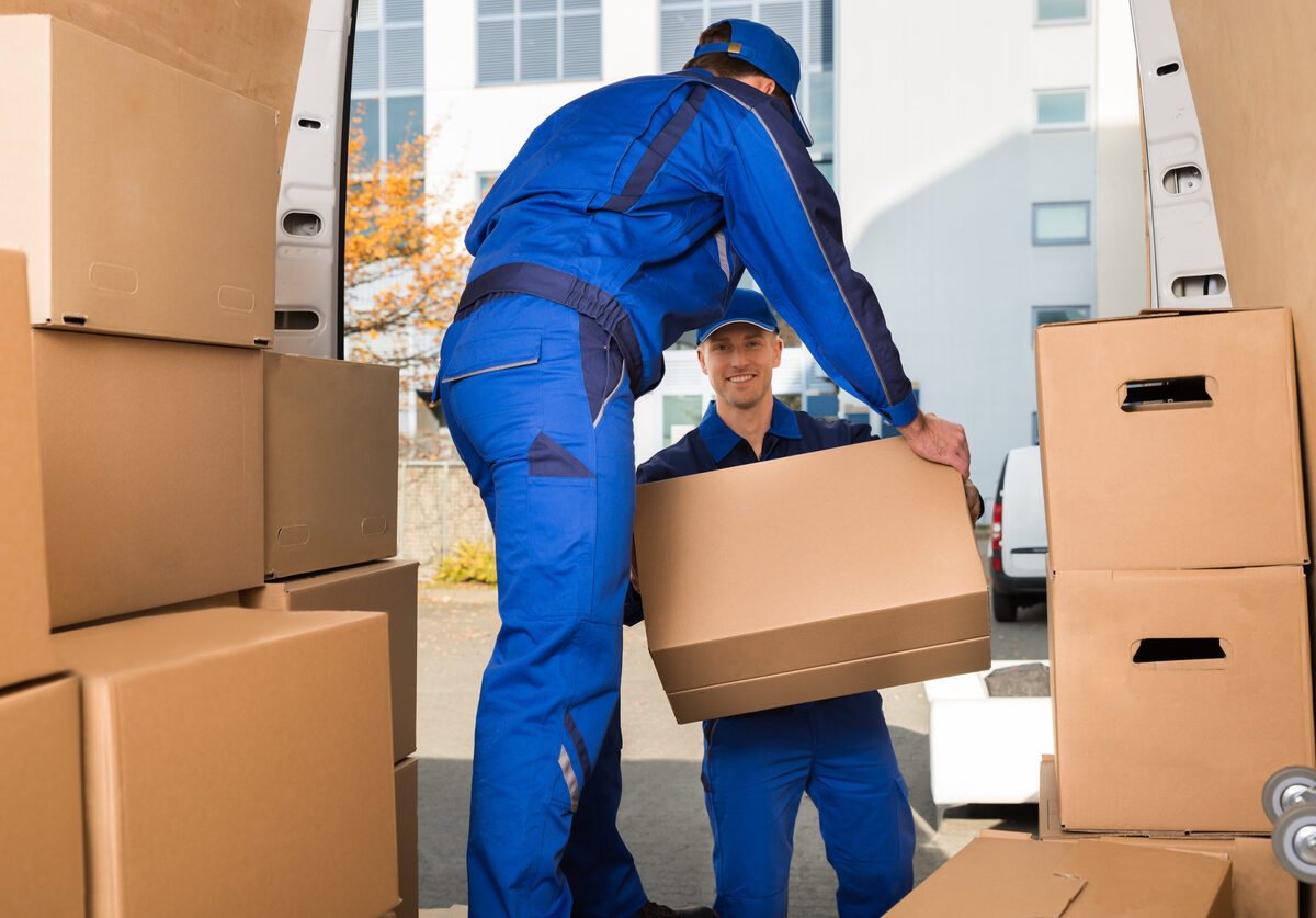 Movers Carrying Sofa