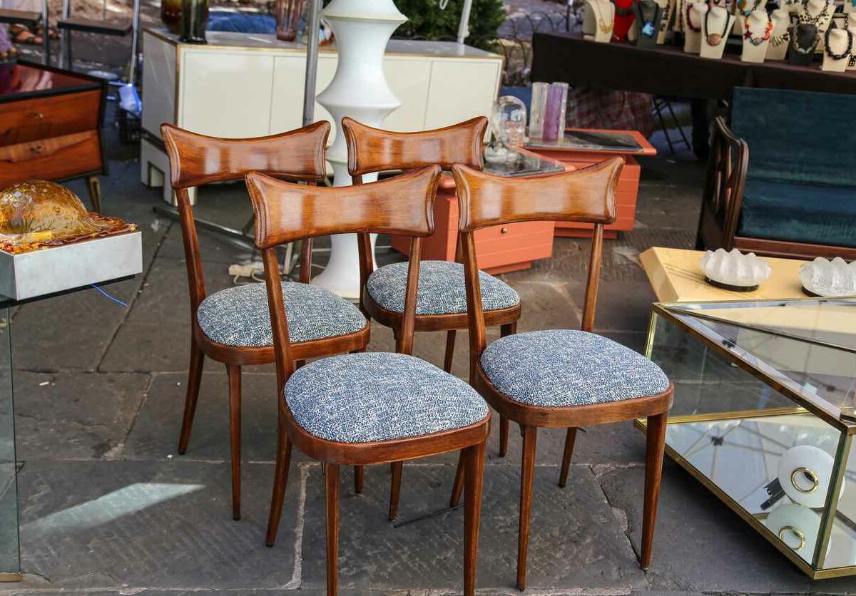 a set of chairs and other random items at an estate sale