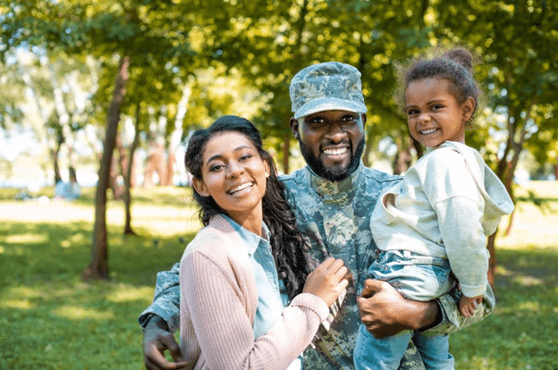 Military family smiling for the camera.