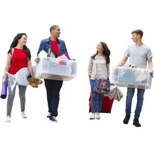 Four college students walking next to eachother carrying moving boxes and items.